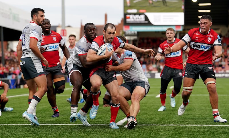 Tomos Williams (centre) has been in outstanding form for his club Gloucester