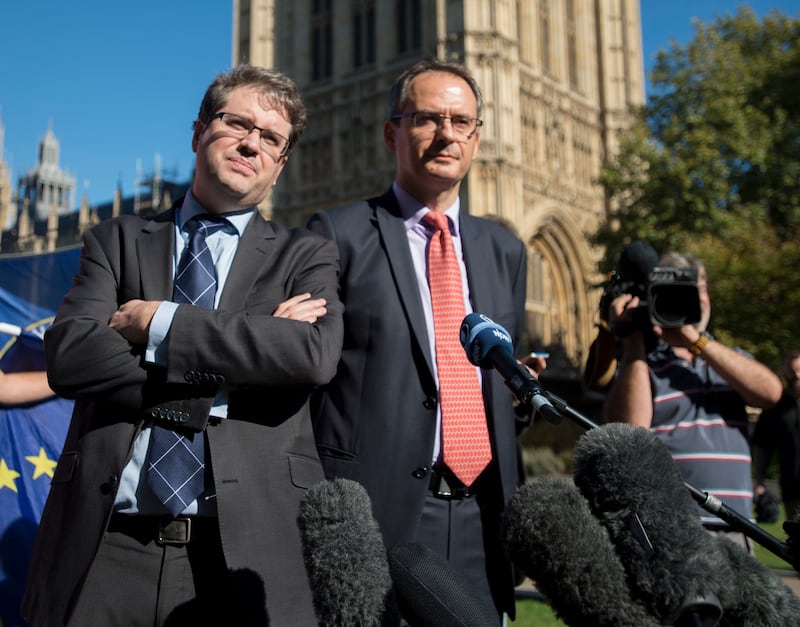 Bellingcat founder Eliot Higgins (left) and investigative journalist Christo Grozev speaking at an event in London