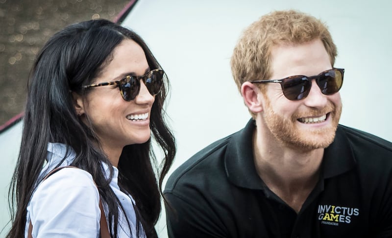 Harry and Meghan watching the wheelchair tennis at the 2017 Invictus Games in Toronto while they were dating