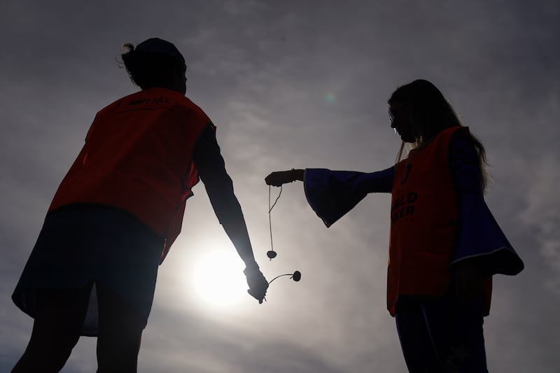 Competitors take part in the annual World Conker Championships at the Shuckburgh Arms in Southwick, Peterborough, on October 13