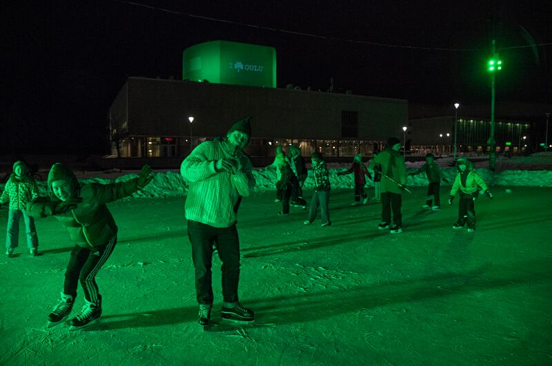 Also in Finland, the Oulu Theatre and Harbour ice rink changed colour (Tourism Ireland/PA)