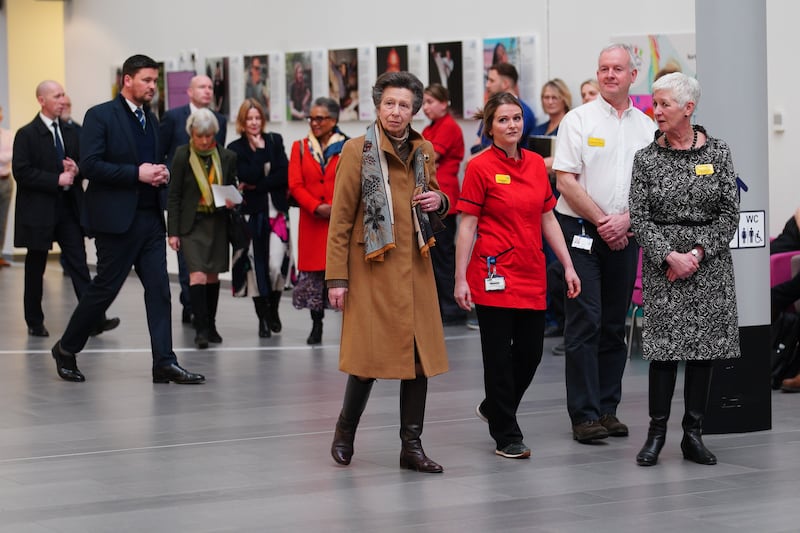 Anne walks through the atrium of Southmead Hospital’s Brunel Building