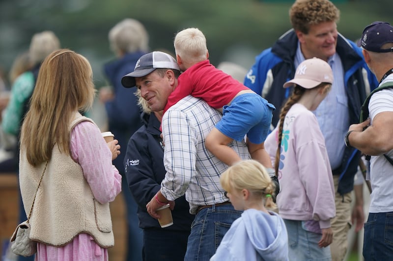 Lucas Tindall, three, was spotted climbing onto his uncle, Peter Phillips (Joe Giddens)