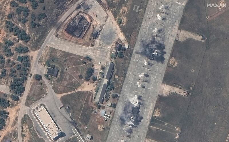 A destroyed MiG 31 fighter aircraft and fuel storage facility at Belbek air base, near Sevastopol (Satellite image ©2024 Maxar Technologies via AP)