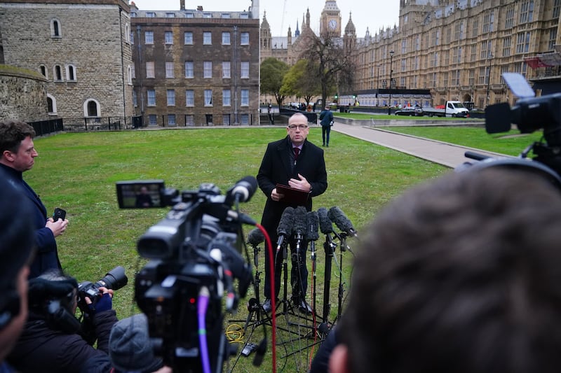 Northern Ireland Secretary Chris Heaton-Harris speaks to the media in College Green, Westminster as powersharing in Northern Ireland is set to return