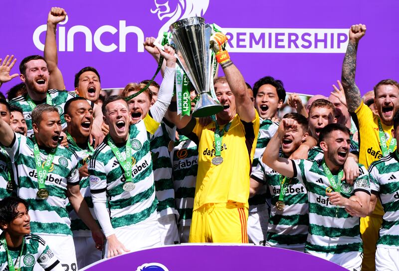 Celtic goalkeeper Joe Hart and McGregor lifted the Premiership trophy