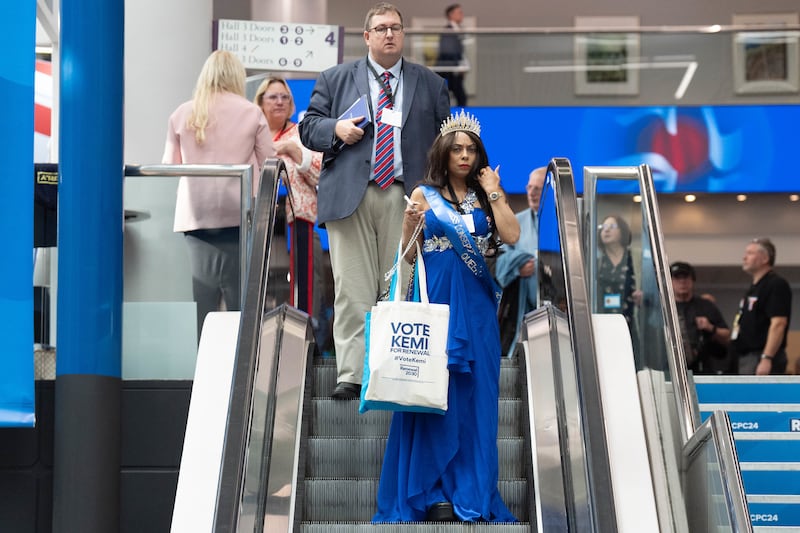 A woman with a Vote Kemi bag is seen during the Conservative Party Conference in Birmingham in September