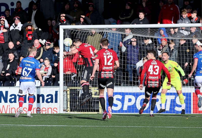 Pacemaker Press 121024
Crusaders v Linfield  Sports Direct Premiership
Crusaders Jimmy Callacher clears the danger  during today's game at Seaview, Belfast.  Photo by David Maginnis/Pacemaker Press