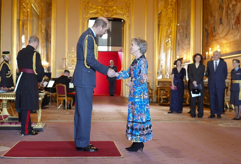 Dame Imelda chatted to William during the investiture ceremony at Windsor Castle