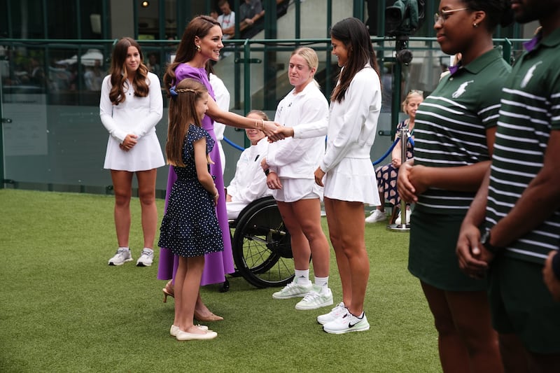 The Princess of Wales and Princess Charlotte meeting Emma Raducanu