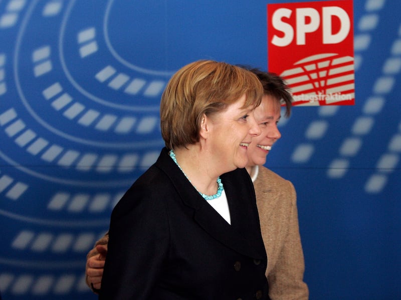 Angela Merkel and Beate Baumann in 2006 (Markus Schreiber/AP)