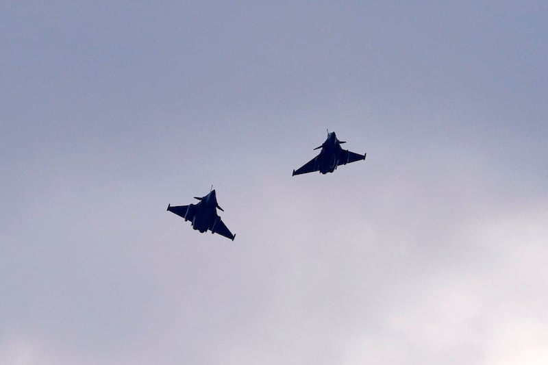 French Dassault Rafale fighter jets fly after a signing ceremony between French President Emmanuel Macron and Croatia’s Prime Minister Andrej Plenkovic (Darko Vojinovic/AP)