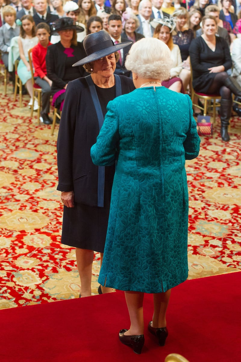 Dame Maggie Smith as she is made a member of the Order of the Companions of Honour by Queen Elizabeth II