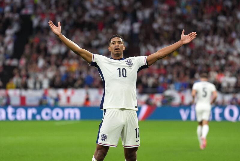 2XCE231 England’s Jude Bellingham celebrates scoring their side’s first goal of the game during the UEFA Euro 2024 Group C match at the Arena AufSchalke in Gelsenkirchen, Germany. Picture date: Sunday June 16, 2024.