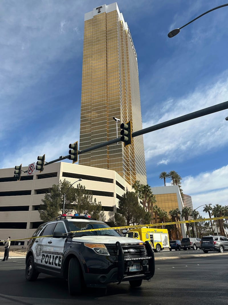 Police block the area in Las Vegas after a vehicle caught fire and exploded outside the lobby of President-elect Donald Trump’s hotel (Ty ONeil/AP)