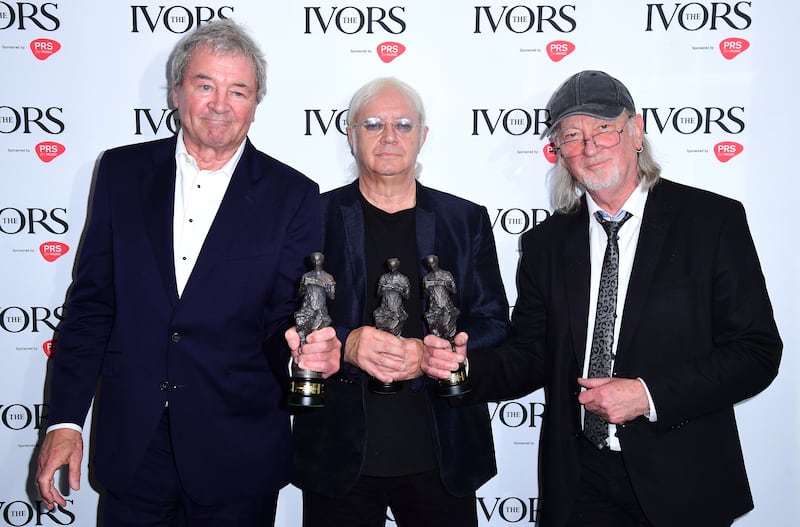Members of the band Deep Purple, Ian Gillan, Ian Paice and Roger Glover (left to right) with the International Achievement Award during the 2019 Ivor Novello Songwriting Awards at Grosvenor House in London