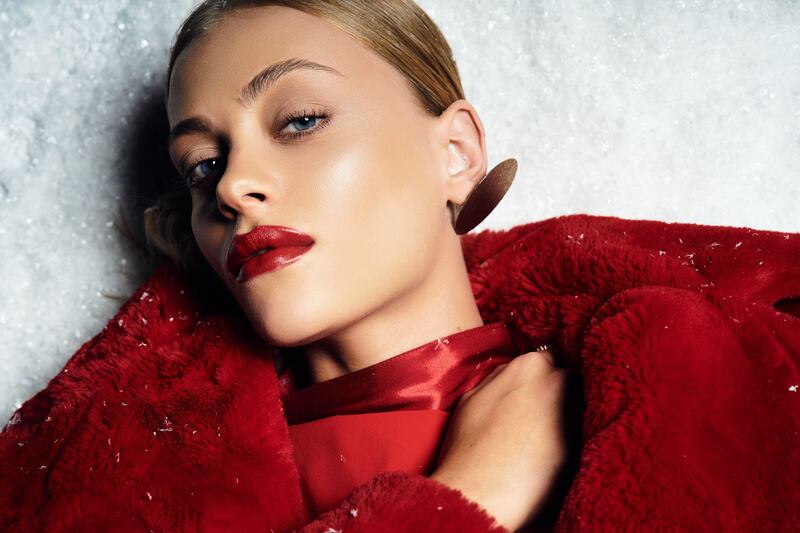 A bold lip and smoky eyes is an easy route to vampy glam