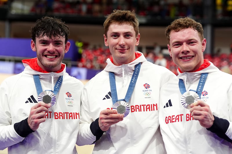 Great Britain’s Ed Lowe, Hamish Turnbull and Jack Carlin with their silver medals after the men’s team sprint final