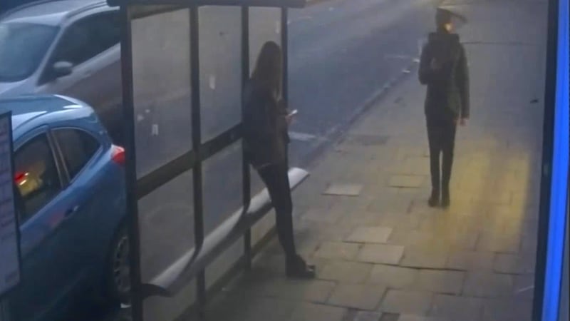 CCTV shows Logan MacPhail, in a baseball cap, approaching Holly Newton at a bus stop in Hexham, moments before he attacked her