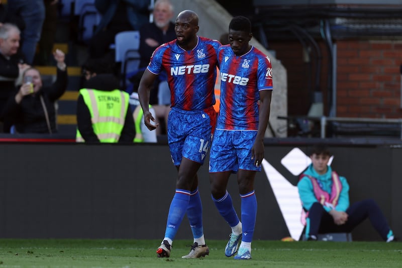 Jean-Philippe Mateta (left) celebrates scoring the decisive goal