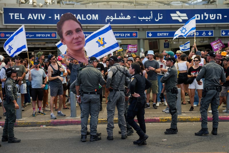 Demonstrators in Tel Aviv, Israel, demand a ceasefire deal and the immediate release of hostages held by Hamas in the Gaza Strip after the deaths of six hostages in the Palestinian territory (Ohad Zwigenberg/AP)