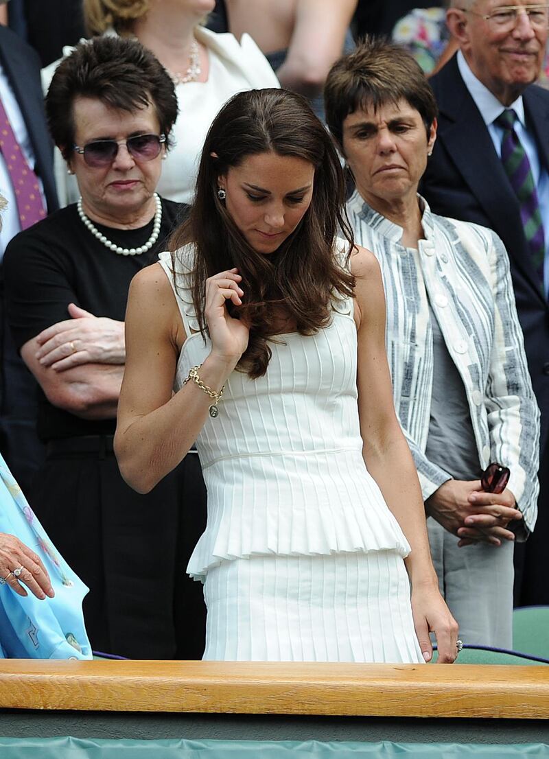 The Princess of Wales wore a pleated pinstripe-inspired dress to her first Wimbledon as a member of the royal family