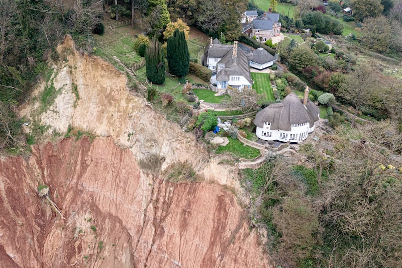 The cottage sits around 40ft from a cliff edge with a 400ft drop, following a small rockfall directly below and a significantly large cliff collapse a few hundred meters away, on a cliff top area between Sidmouth and Ladram Bay