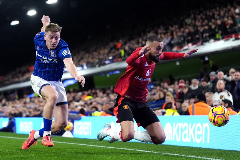 Ipswich’s Liam Delap (left) had two great chances held out by Onana