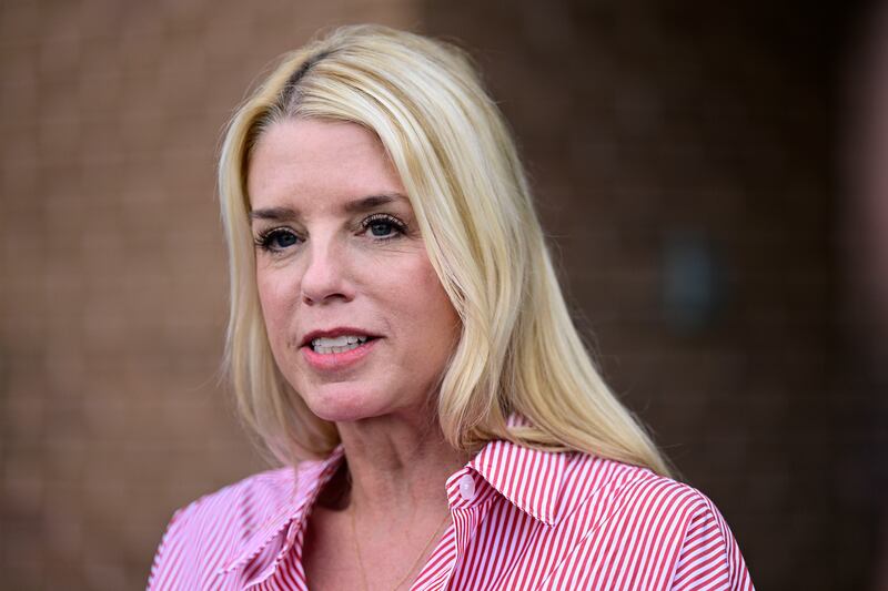 Pam Bondi, former Florida Attorney General, speaks to reporters outside an election integrity volunteer training. (AP/Derik Hamilton)