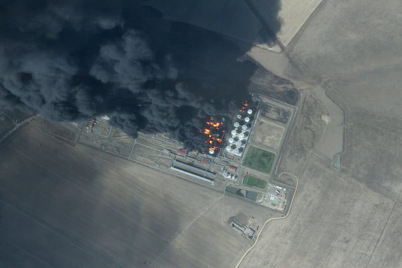 This satellite photo from Planet Labs PBC shows a fire at an oil depot earlier hit by a drone attack near Proletarsk, Russia, on Monday (Planet Labs PBC via AP)