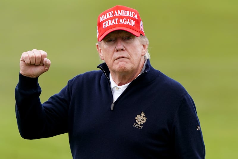 Former US president Donald Trump playing golf at Turnberry golf course during his visit to the UK in May 2023