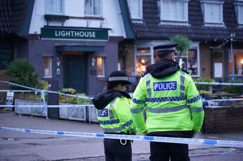 Police at the scene of the shooting at the Lighthouse Inn in Wallasey Village