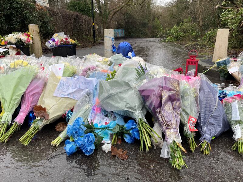 Flowers placed near the scene in Scribers Lane, Hall Green