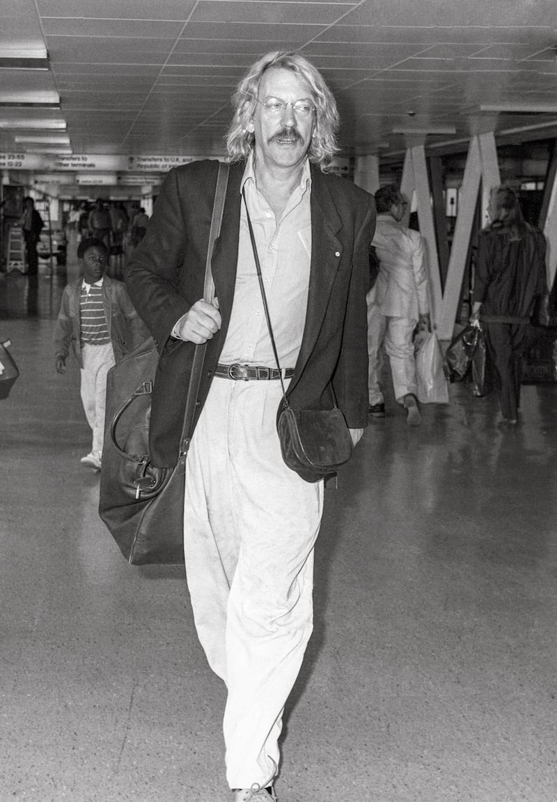 Canadian actor Donald Sutherland arriving at London’s Heathrow Airport in September 1985 (David Parker/Alamy)