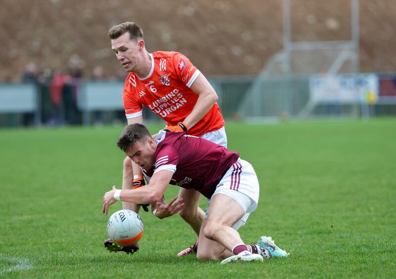 Ballymacnab’s Ryan Watters  and  Clann Eireann’s Sean McCarthy during Sunday’s game at Pearse Og Park.
PICTURE COLM LENAGHAN