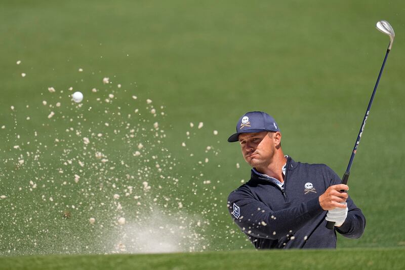 Bryson DeChambeau hits from the bunker on the second hole during the second round of the Masters (George Walker IV/AP)