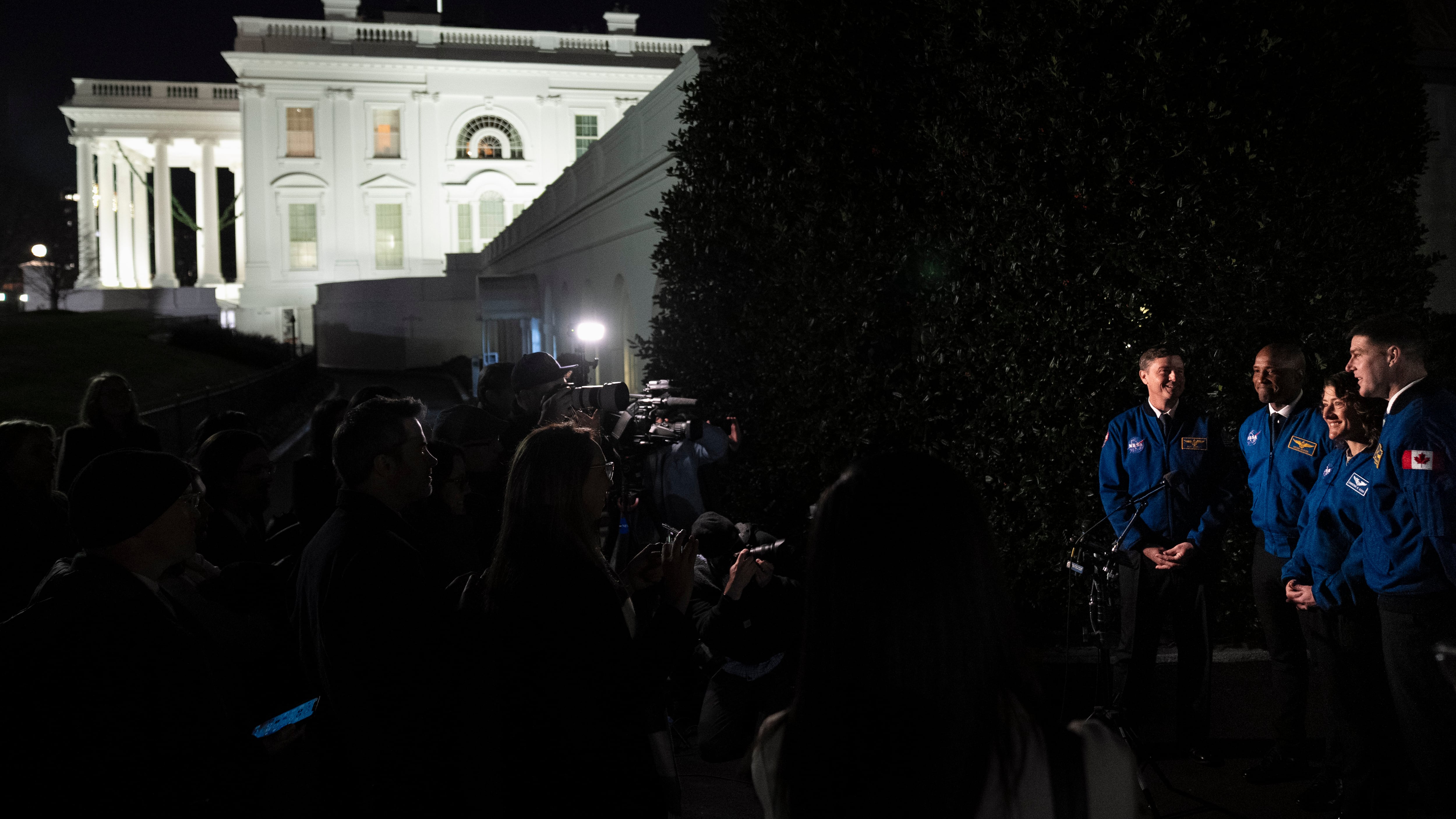 Artemis II crew members, from left, Reid Wiseman, Victor Glover, Christina Hammock Koch,and Jeremy Hansen speak to the media outside the West Wing of the White House (Andrew Harnik/AP)