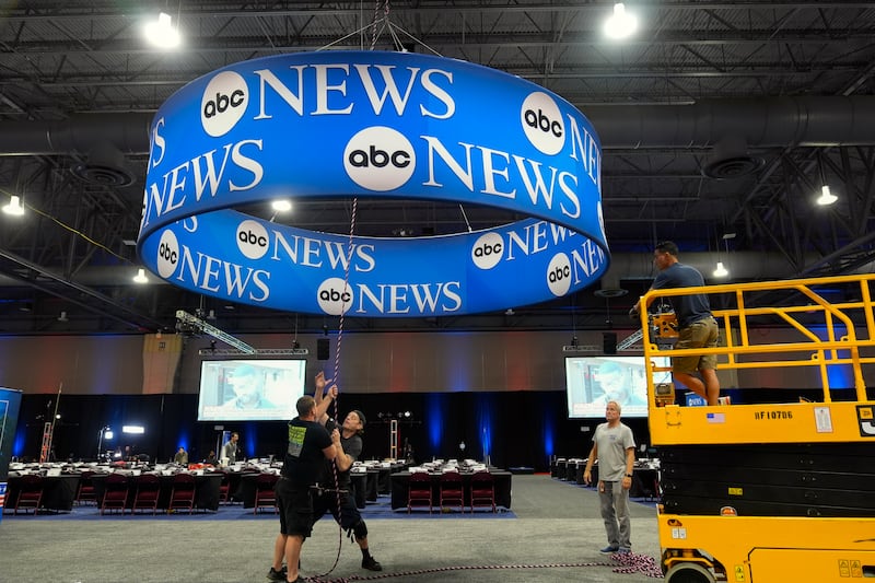 Signage is installed at the media filing centre ahead of the presidential debate between Donald Trump and Kamala Harris (Pablo Martinez Monsivais/AP)