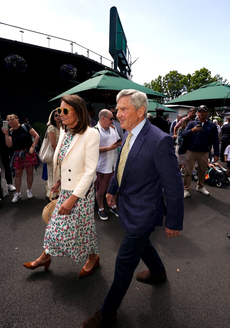 Carole and Michael Middleton arriving on day four of the championships