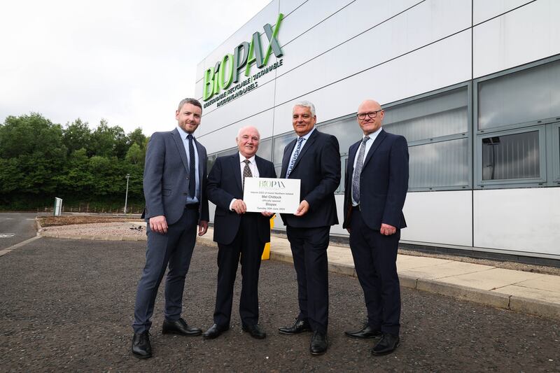 L-R: Liam O’Connor and Terry Cross from Biopax with the interim Invest NI boss Mel Chittock and West Belfast MP Paul Maskey at the new factory in Springvale Business Park.