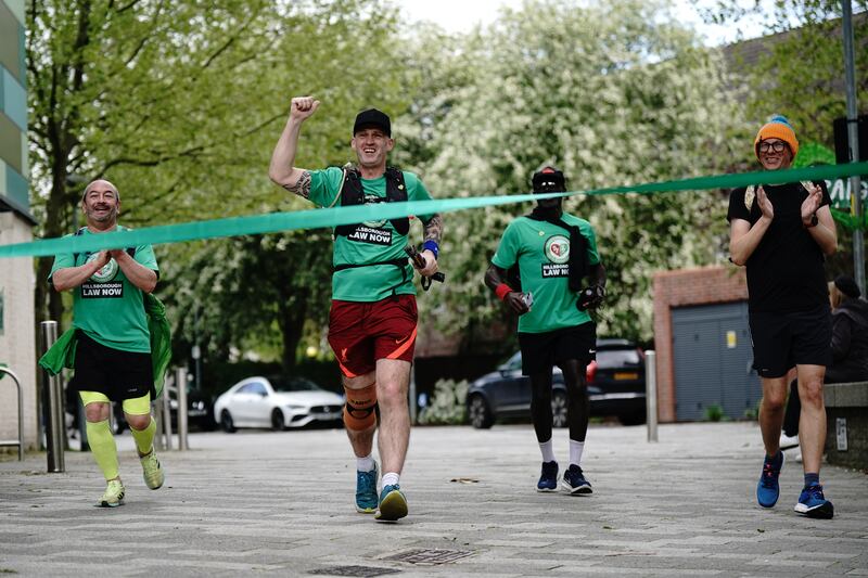 Mik Parkin finishes his charity run at Grenfell Tower