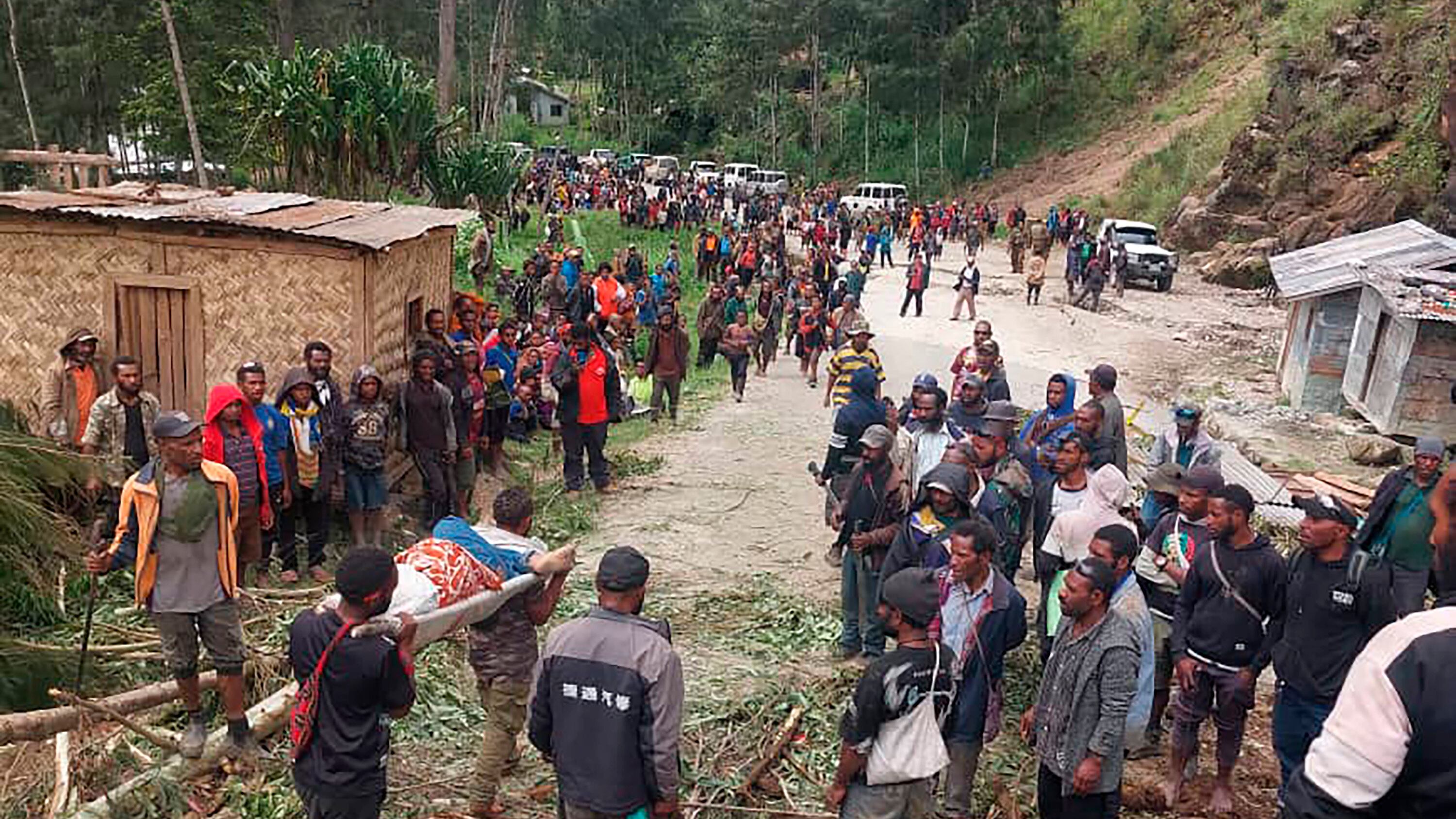 Dozens of homes, and their occupants, were buried when the land collapsed on Friday (Kafuri Yaro/UNDP Papua New Guinea/AP)