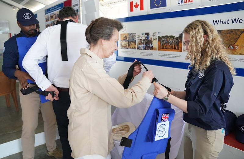 The Princess Royal dons a protective vest as she visits the Halo Trust site in Muhamalai, Sri Lanka