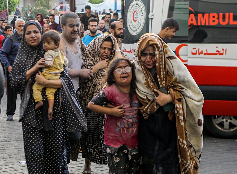 Injured Palestinians arrive at al-Shifa Hospital (Abed Khaled/AP)