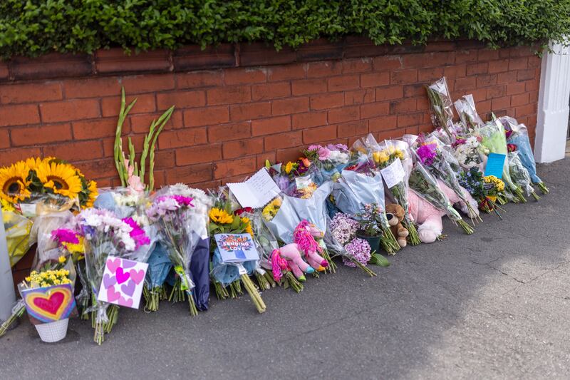 Floral tributes near the scene of the incident in Hart Street, Southport