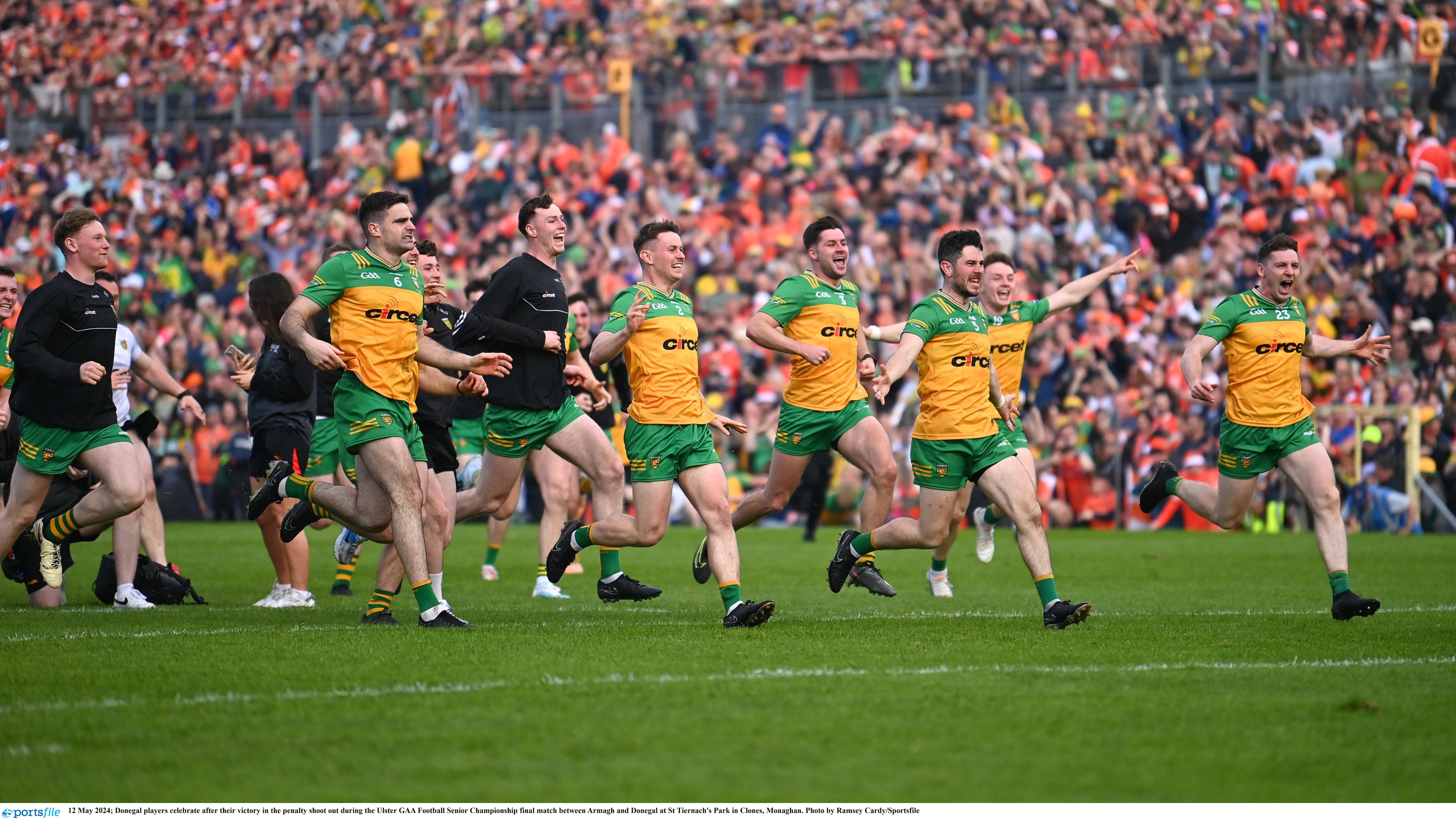 Donegal players celebrate after their victory in the penalty shoot out during the Ulster GAA Football Senior Championship final match between Armagh and Donegal 2024.