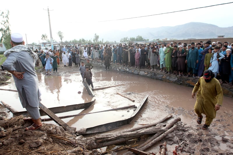 The storm caused landslides, destroying homes across the region (AP)