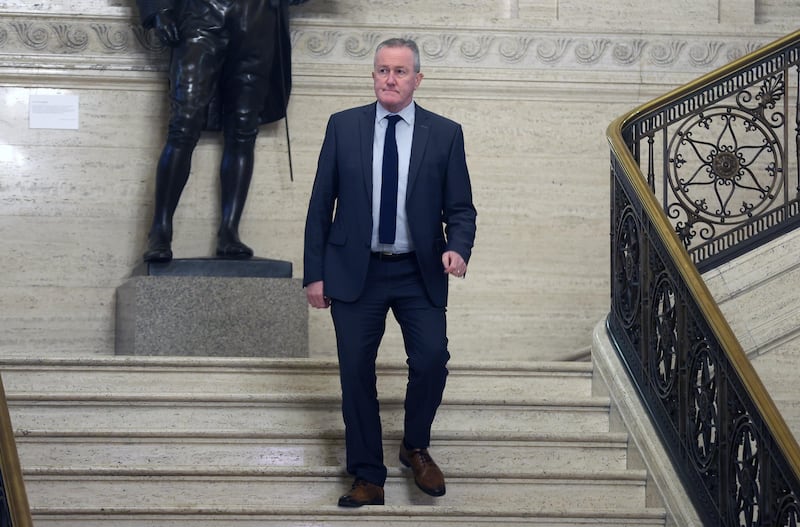 Sinn Fein's Conor Murphy arrives for the first sitting of the assembly at Stormont on Tuesday.
PICTURE COLM LENAGHAN