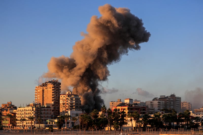 Smoke rises from a building hit in an Israeli air strike on southern Lebanon (Mohammed Zaatari/AP)