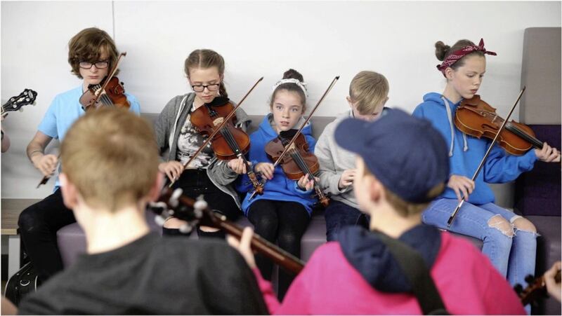 Students in full flow during yesterday&#39;s Slow Session at the Belfast Summer School of traditional Music at Ulster University  Picture: Hugh Russell 